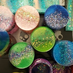 Herbal trays and jars that seal. Varieties of color shapes and sizes.